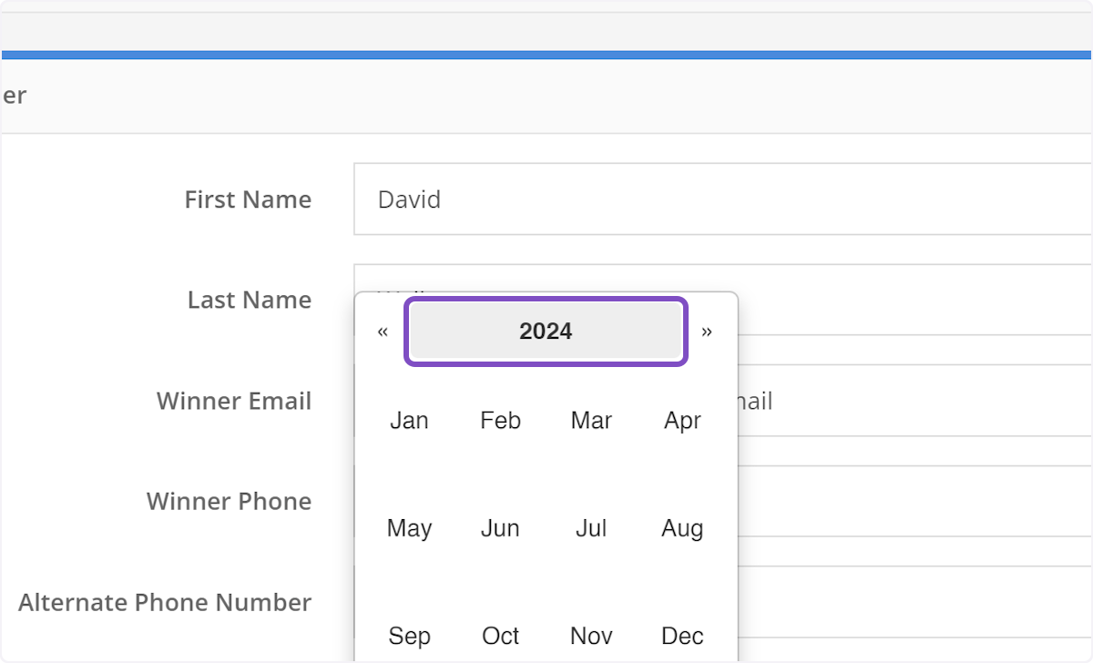 To change the year, click on the Month and Year at the top of the calendar.
